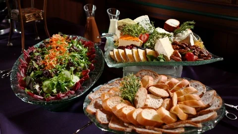 Salad bread and cheese trays. Self serve catering food buffet B Stock Footage 114768010