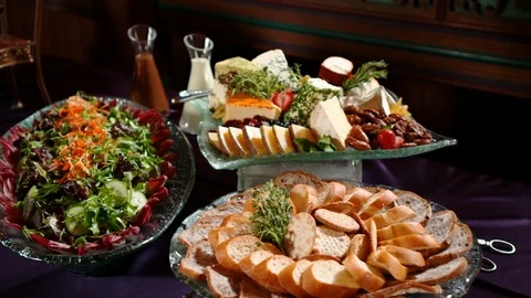 Salad bread and cheese trays. Self serve catering food buffet C Stock Footage 114771344