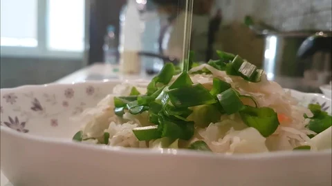 Salad of cabbage and onions is poured with oil Video stock 80879970
