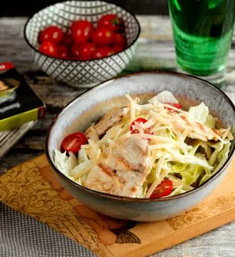 Salad caesar with chicken on the table Stock Photos