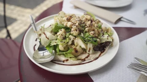 Salad with cauliflower and hazelnuts 2 FHD 120fps Video stock 235823249