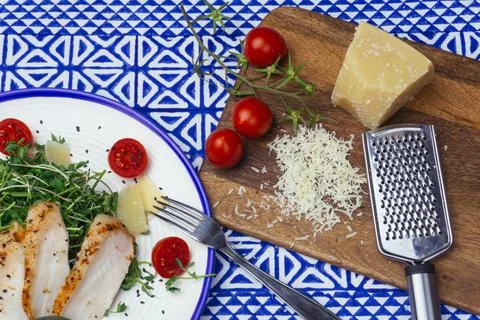 Salad with chicken (Caesar salad) with micro-greens, cherry tomatoes and Stock Photos