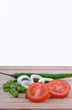 Salad on chopping board Stock Photos
