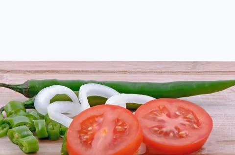 Salad on chopping board Stock Photos
