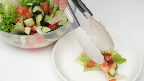Salad in a clear cup Stock Footage 267002481