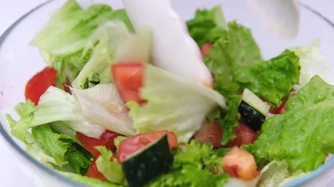 Salad in a clear cup Stock Footage 269870825