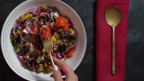 Salad of crispy fried eggplant, pepper, onions and tomatoes with feta cheese Stock Footage 282954045