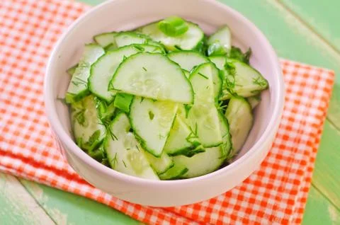 Salad with cucumbers Stock Photos