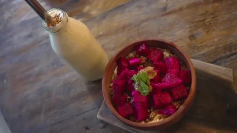 Salad with Dressing and Dragon Fruit, Mix Exotic Fruits and milkshake bottle Stock Footage 247839876