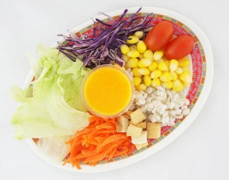 Salad with dressing Stock Photos