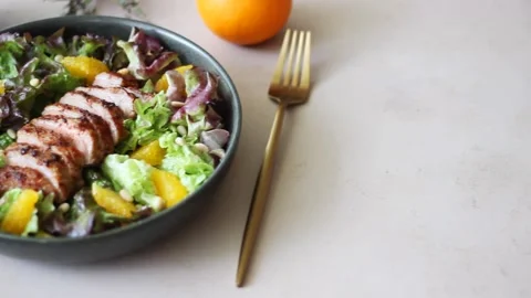 Salad with duck, oranges and nuts. Healthy eating. Diet. Stock Footage 196210948