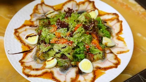 Salad of eel with vegetables and quail eggs. Video stock 102172210