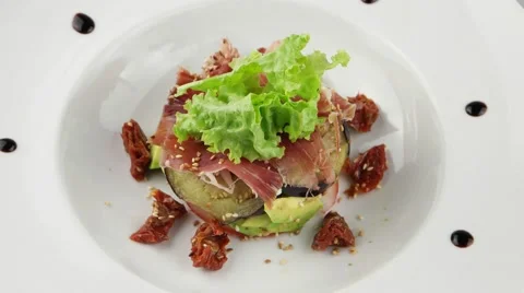 Salad with eggplant and avocado (loop) Stock Footage 56847327