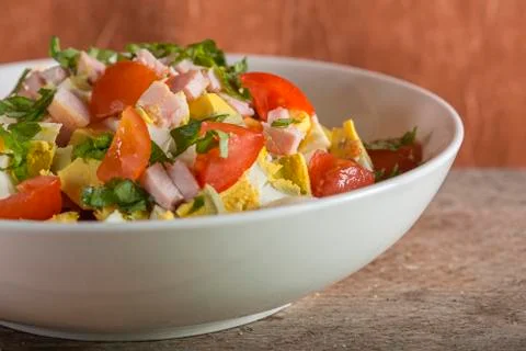 Salad with eggs and ham Stock Photos