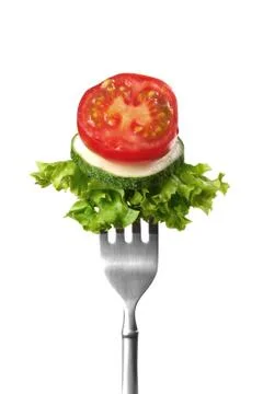 Salad on a fork Stock Photos
