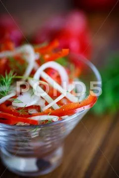 Salad with fresh peppers and onions Stock Photos
