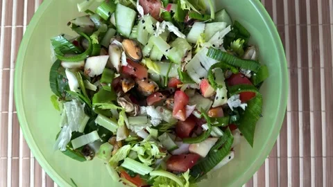 Salad with fresh vegetables like celery, tomatoes, cucumbers, garlic arrows Stock Footage 274959278