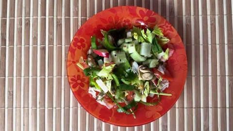 Salad with fresh vegetables like celery, tomatoes, cucumbers, garlic arrows Stock Footage 274959400