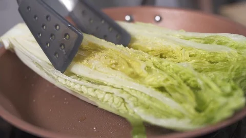 Salad in the frying pan Stock Footage 127124706