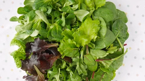 Salad greens on a plate. Video stock 246730102
