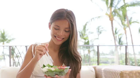 Salad - healthy eating woman laughing eating food Stock Footage