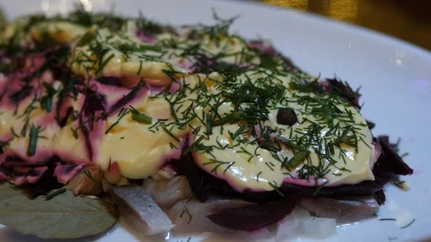 Salad Herring Fish Homemade. Beetroot Parsley green Onion mixed Mayonnaise sauce 스톡 동영상 127716636