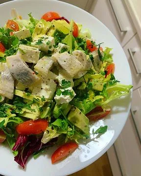 Salad with herring Stock Photos