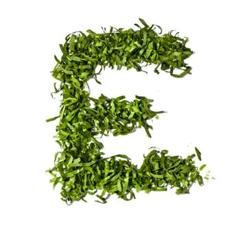 Salad letter e on white background Stock Photos
