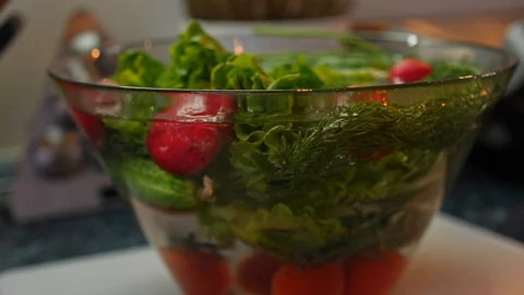 Salad with lettuce and fresh vegetable close up Vídeo Stock 128603443