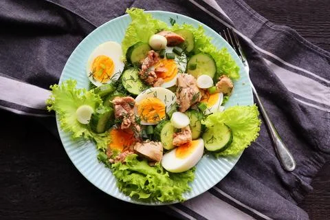 Salad from the liver of codfish, eggs, lettuce Stock Photos