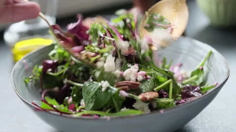 Salad making video 4k. Fresh nutrition salad. Homemade cooking footage. Stock Footage 232215575