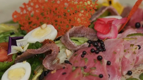 Salad with meat eggs vegetable preparing indoors cook delicious eating garnish Stock Footage 103290640