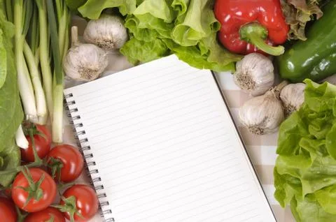 Salad with open notebook Stock Photos