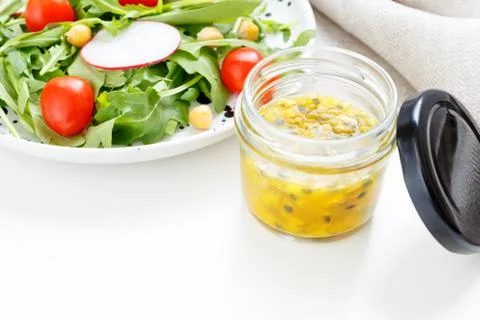 Salad with passion fruit dressing Stock Photos