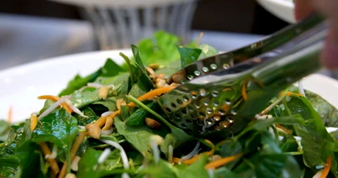 Salad with peanuts and herbs Stock Footage 276575651