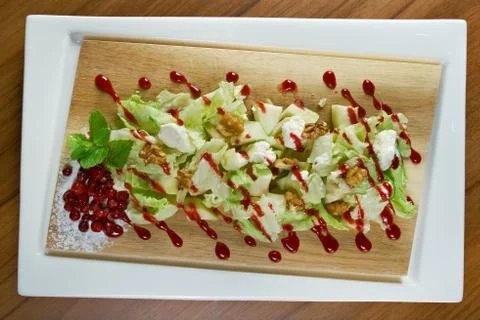 Salad with pears, walnuts Fotos de archivo