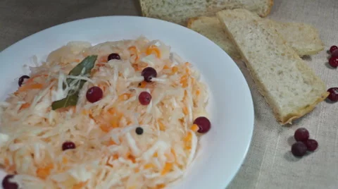 Salad of pickled cabbage with cranberries, carrots, bay leaf 動画素材 59081206