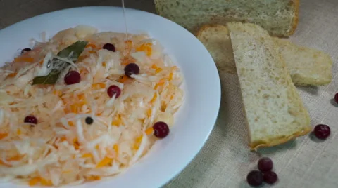 Salad of pickled cabbage with cranberries, carrots, bay leaf 動画素材 59081243