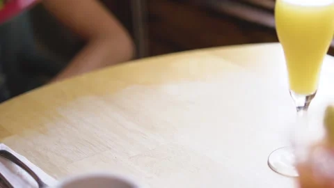 A salad is placed onto a table at a restaurant Stock Footage 130587708
