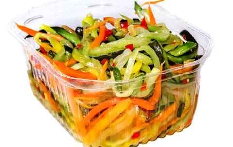 Salad in a plastic container Stock Photos