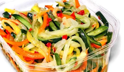 Salad in a plastic container Stock Photos
