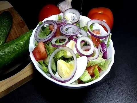 Salad plate, black background Stock Footage 75493076