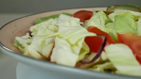 Salad on a plate Stock Footage 241816629