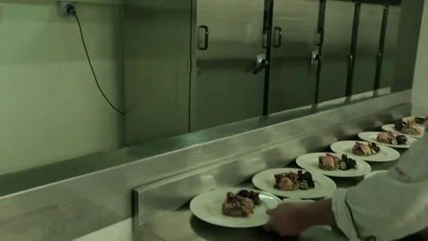 Salad plates on table Stock Footage 77053605