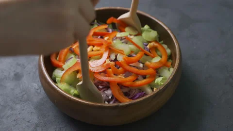 Salad preparation process. Process of mixing fresh salad Stock Footage 101456826