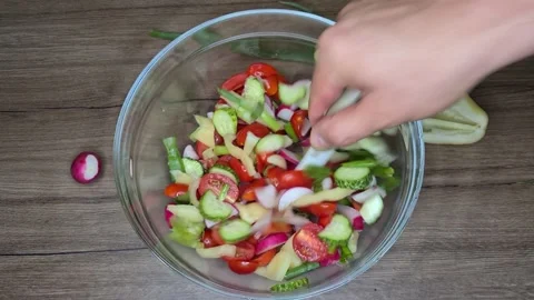 Salad Preparation Process. Process Of Mixing Fresh Salad. Stock Footage 165505389