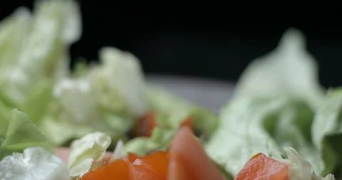 Salad preparing macro with herbs and chia seeds slowmotion Stock-Footage 137924820