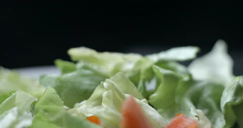 Salad preparing with sauces macro slowmotion Video stock 137924880