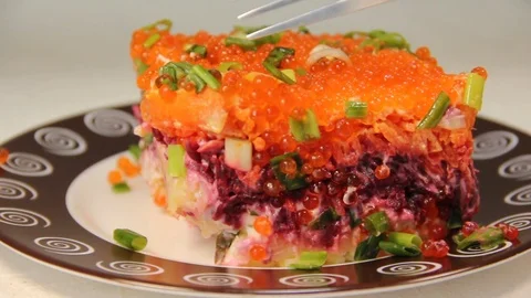 Salad with red caviar, fork, beet, meal, christmas Stock Footage 84138763