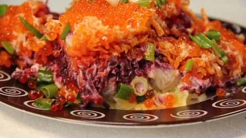Salad with red caviar, fork, beetroot, meal Stock Footage 84138779